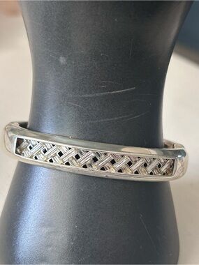Brighton Andaluz Hinged Bangle w/ distinctive woven-look center crystal detail.